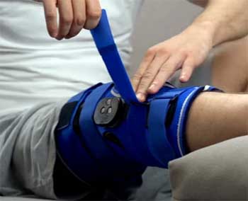 spring loaded knee brace